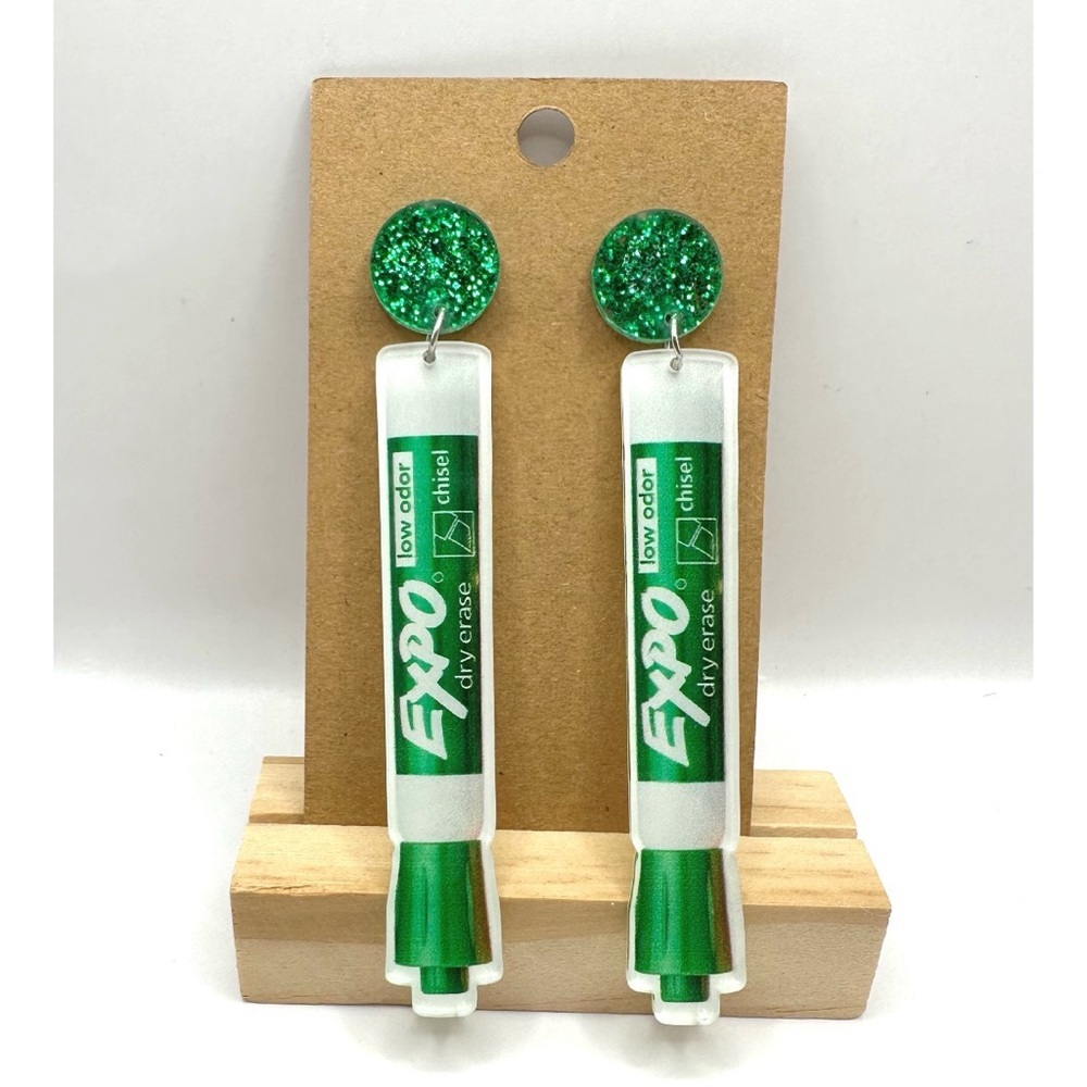 Pair of acrylic dangle earrings shaped like green EXPO dry erase markers